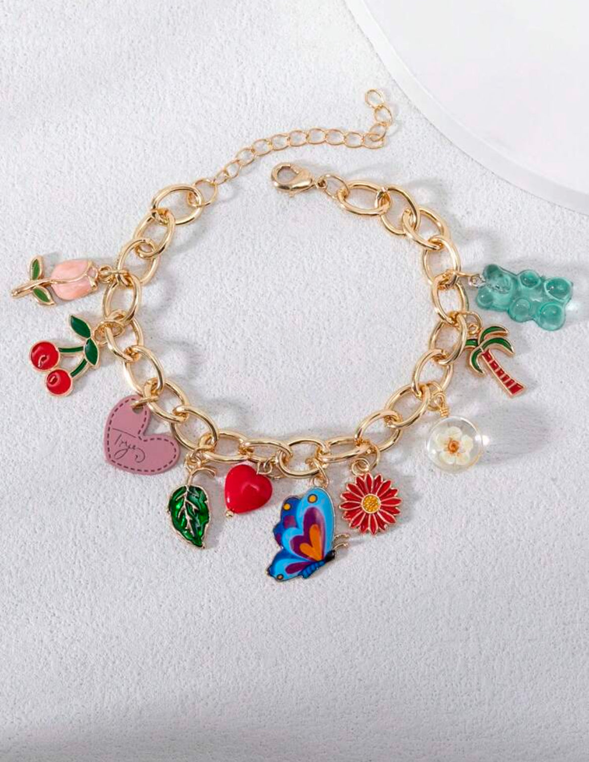 Bracelet With Multiple Charms Including Butterfly, Flower, Heart, Leaf, Cherry, Bear, Epoxy Resin