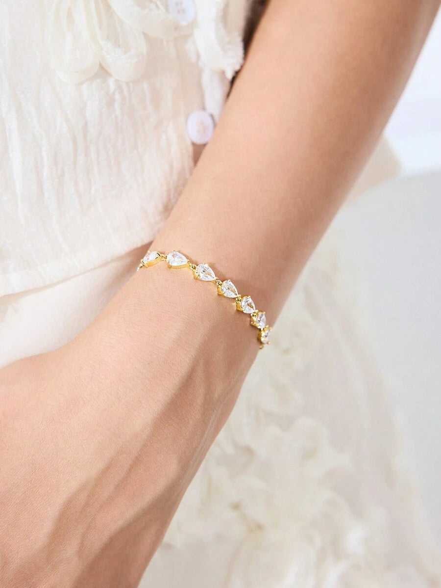 18K GOLD PLATED LEAF-SHAPED CUBIC ZIRCONIA BRACELET.