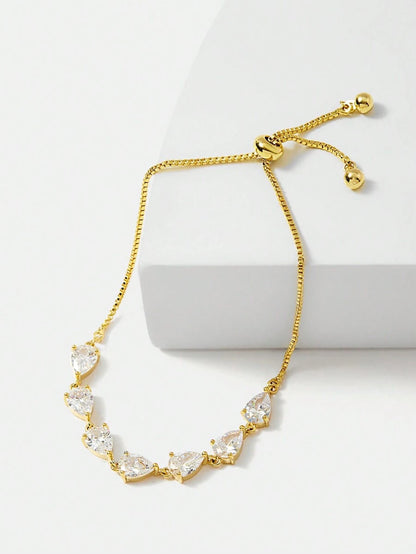 18K GOLD PLATED LEAF-SHAPED CUBIC ZIRCONIA BRACELET.
