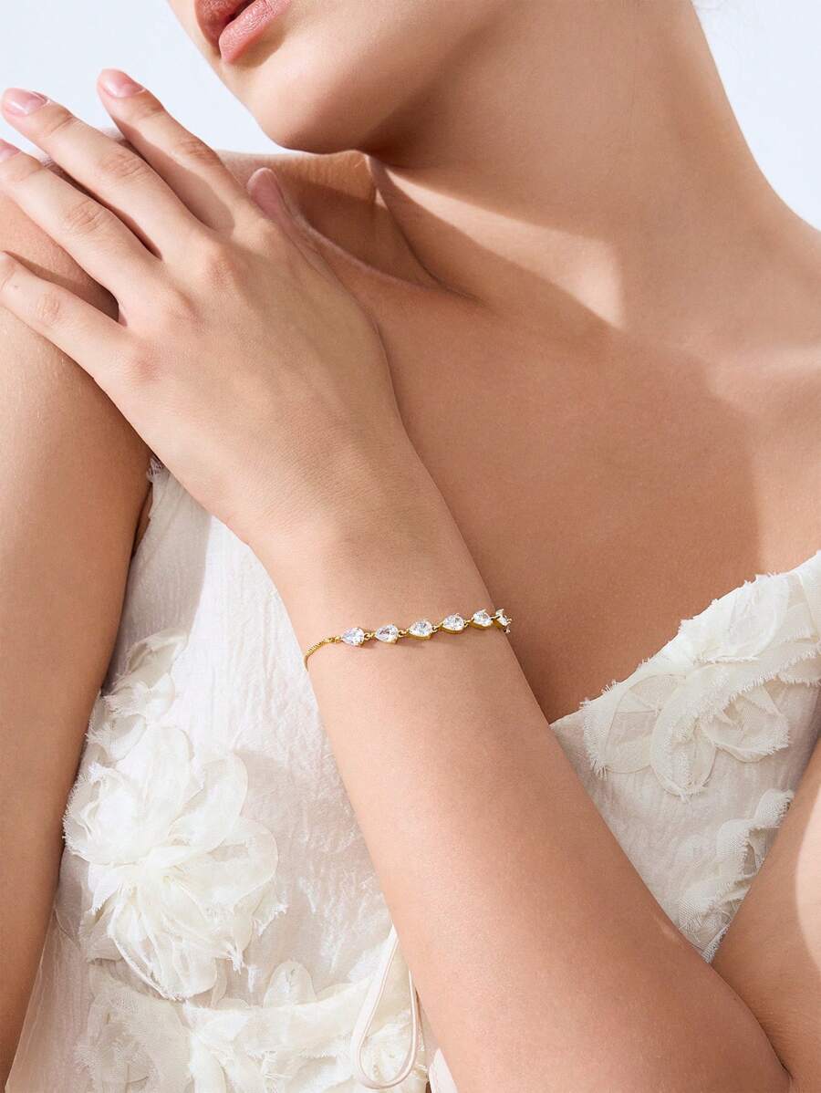 18K GOLD PLATED LEAF-SHAPED CUBIC ZIRCONIA BRACELET.