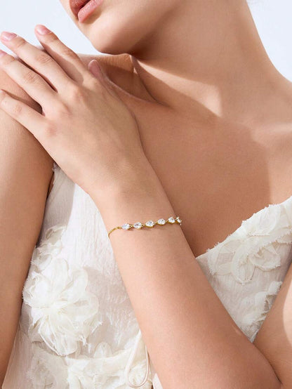 18K GOLD PLATED LEAF-SHAPED CUBIC ZIRCONIA BRACELET.