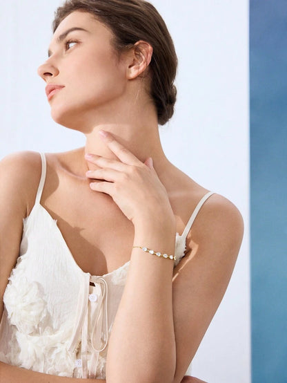 18K GOLD PLATED LEAF-SHAPED CUBIC ZIRCONIA BRACELET.