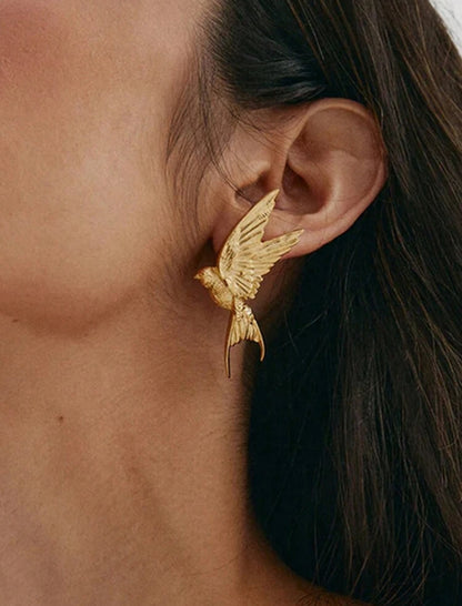 Metal Earrings With Peace Pigeon Design