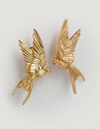 Metal Earrings With Peace Pigeon Design