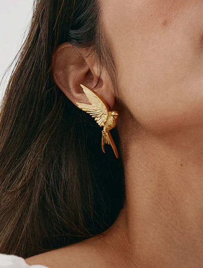 Metal Earrings With Peace Pigeon Design