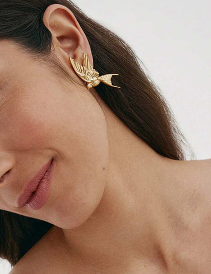 Metal Earrings With Peace Pigeon Design