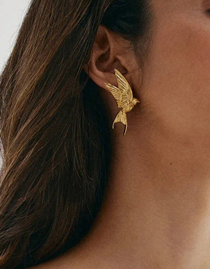 Metal Earrings With Peace Pigeon Design