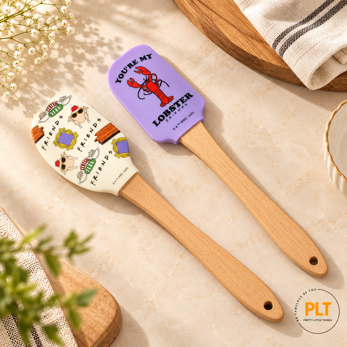 FRIENDS TV series two-piece silicone spatula set featuring You're My Lobster and Central Perk designs with wooden handles