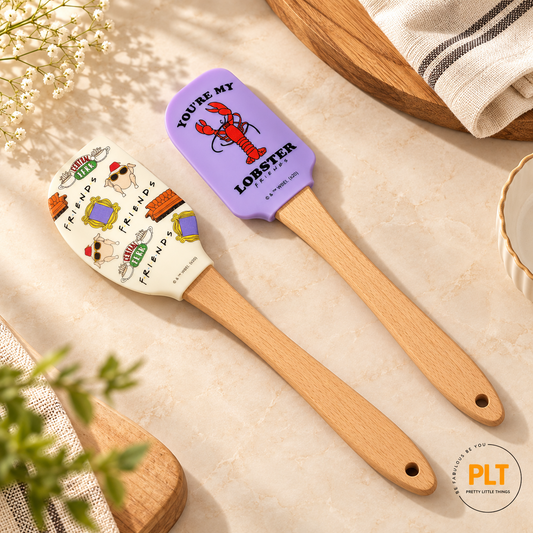 FRIENDS TV series two-piece silicone spatula set featuring You're My Lobster and Central Perk designs with wooden handles